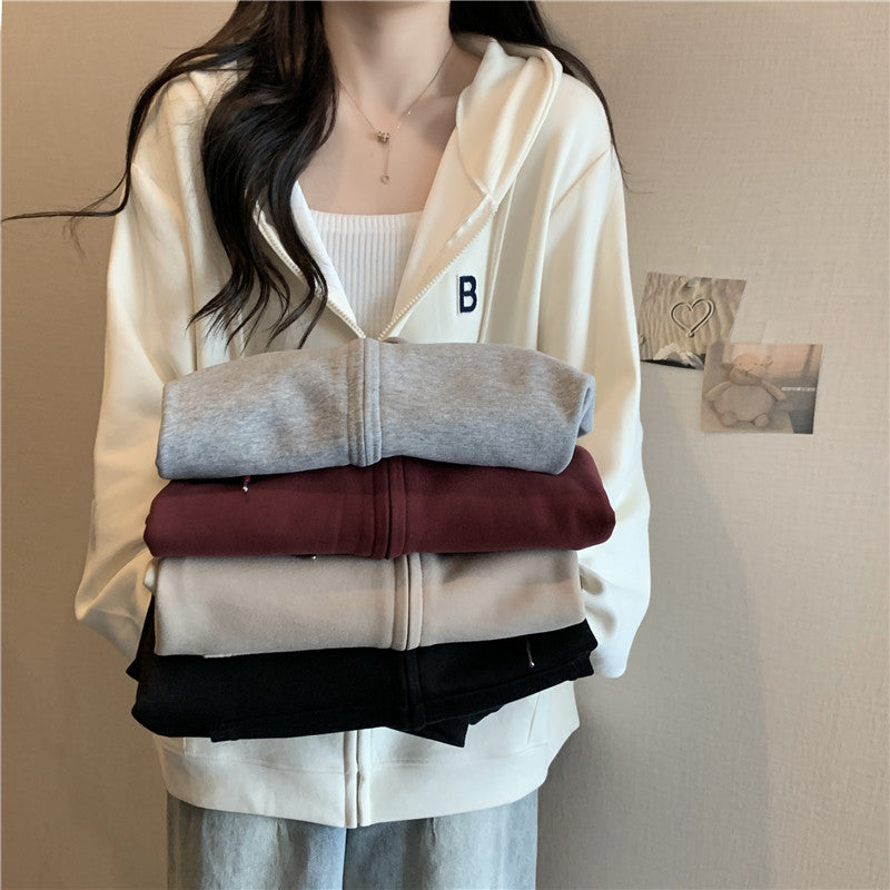 Femme Cozy Zip-Up Hættetrøje med funktionelle Kængurulommer Stilla