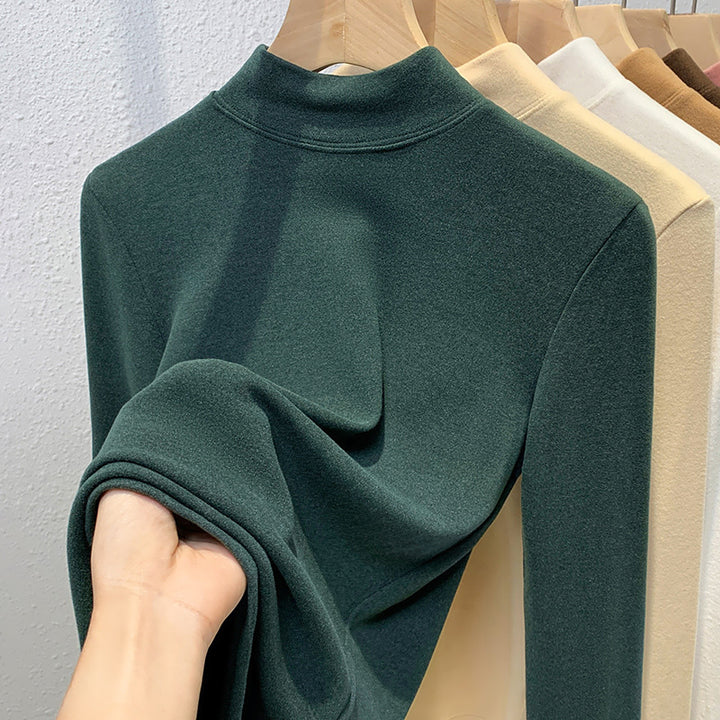 Dame Turtleneck-overdel i blødt strækmateriale med figursyet snit Stilla