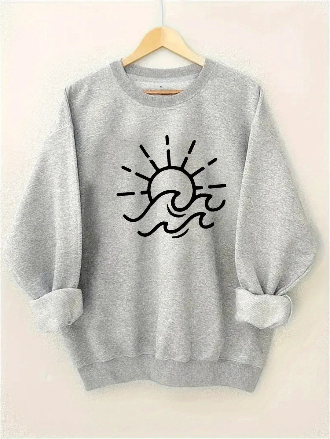 Kvinders sweatshirt med kreativt sol- og bølgedesign Stilla