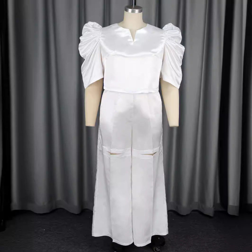 Damer Elegant jumpsuit med voluminøse puffærmer og smart talje detaljer Skovae