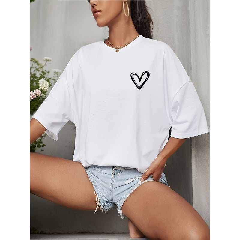 Dame T-shirt med afslappet hjerte-motiv og oversized skjæring Stilla