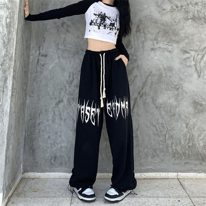 Dame baggy bukser med unikt graffiti design Stilla