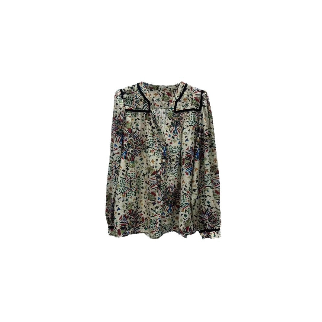Damebluse med detaljeret blomsterdesign og elegante accenter Stilla