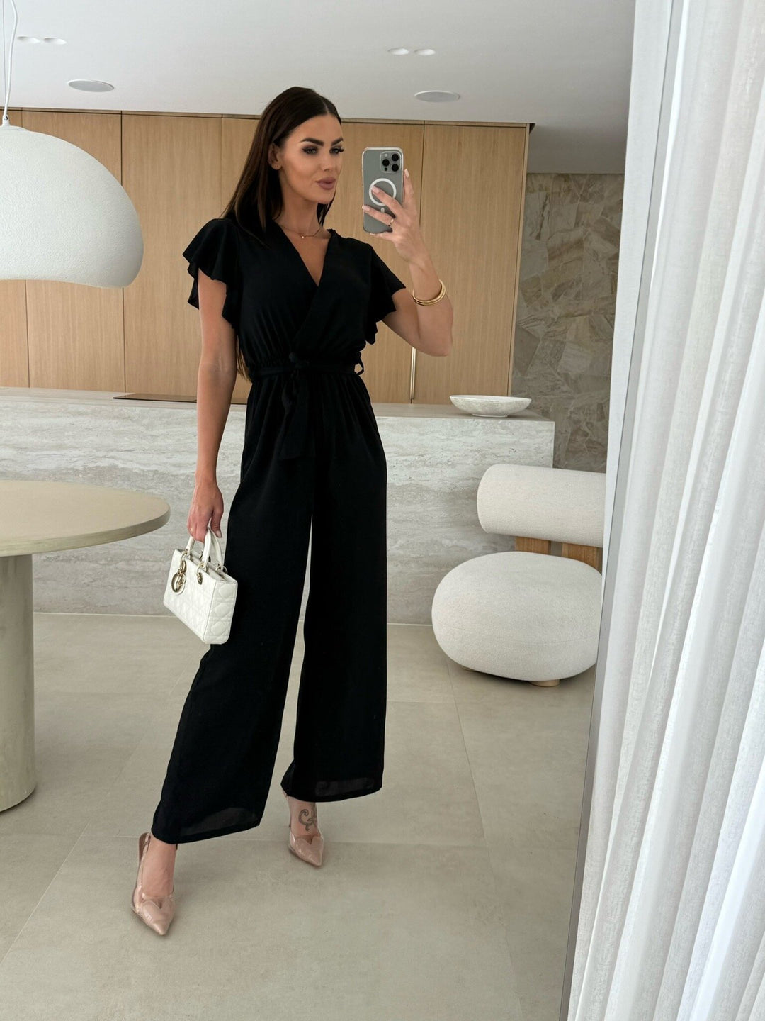 Dame elegant jumpsuit med indviklet udseende og flæseærmer Stilla
