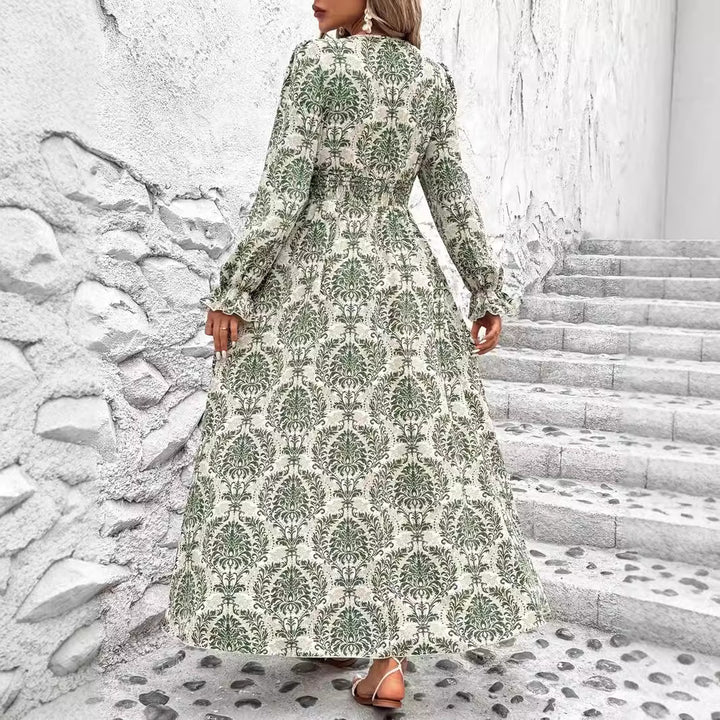 Dame Maxikjole med floralt design og vidde skørt Stilla