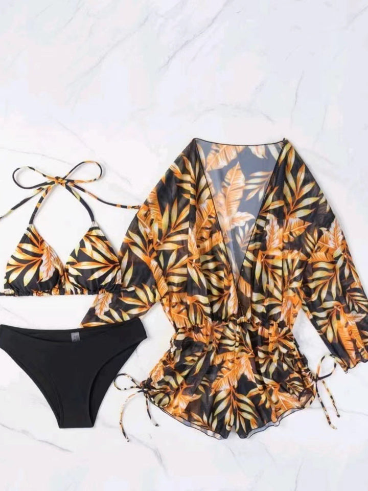 Dame bikini-sæt med blomsterdetaljer og moderne cover-up Stilla