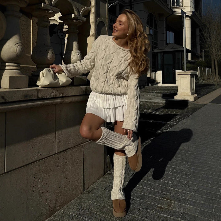 Kvinders chunky strikket sweater med fashionable kabeldesign Stilla