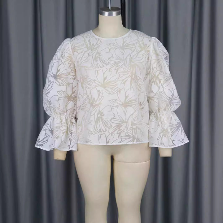 Damer Elegant Bluse med voluminøse ærmer og blomstermotiv Skovae