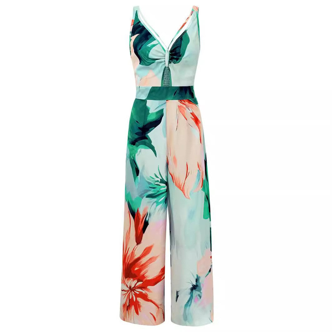 Dame jumpsuit med blomsterprint og bindebælte Stilla