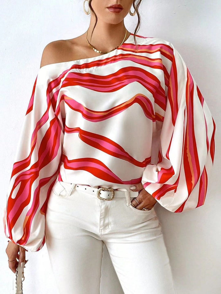 Dame Off-Shoulder-bluse med voluminøse ærmer og moderne stribemønster Stilla