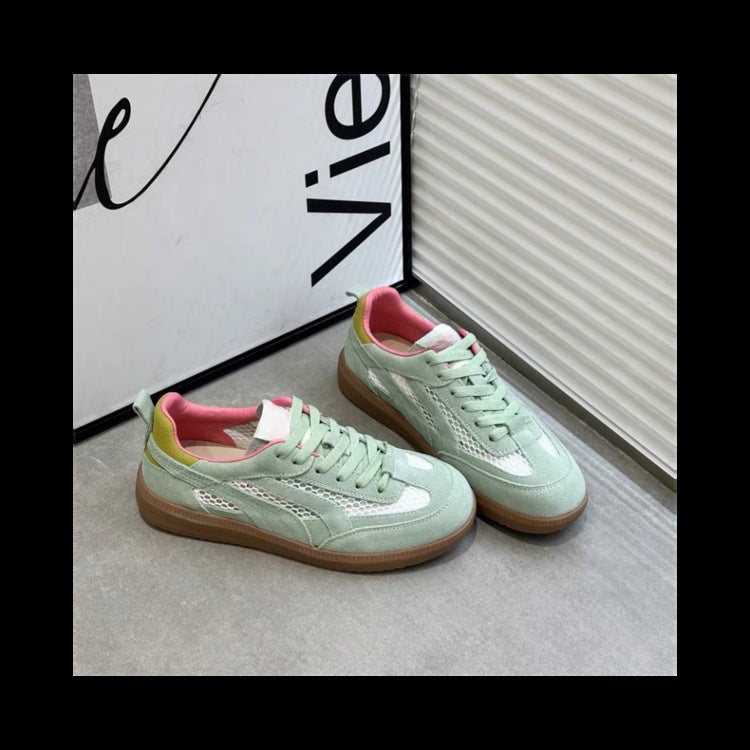 Dame sneakers i sportsligt-elegant design med åndbart mesh-overflade og modeaccent Stilla