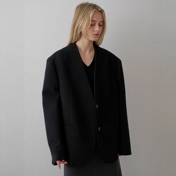 Kvinders elegante strikket blazer med asymmetrisk snit Stilla