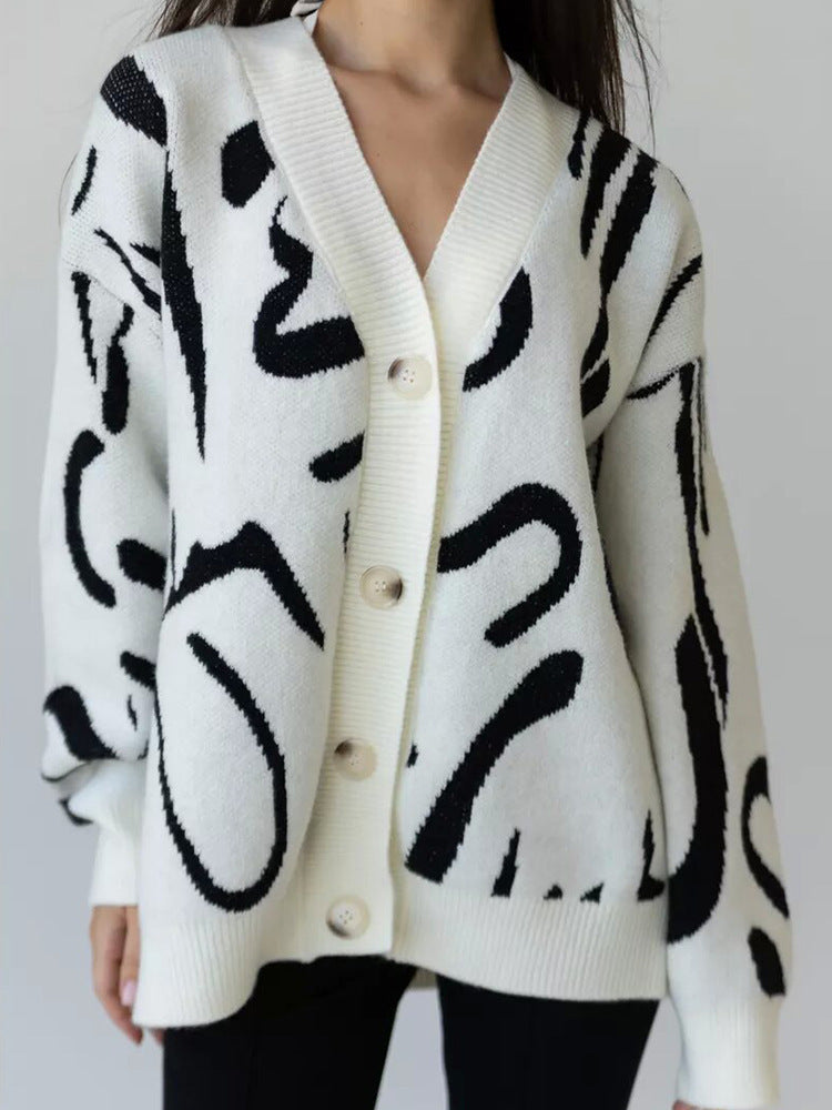 Dame cardigan med moderne mønster og elegante knapper