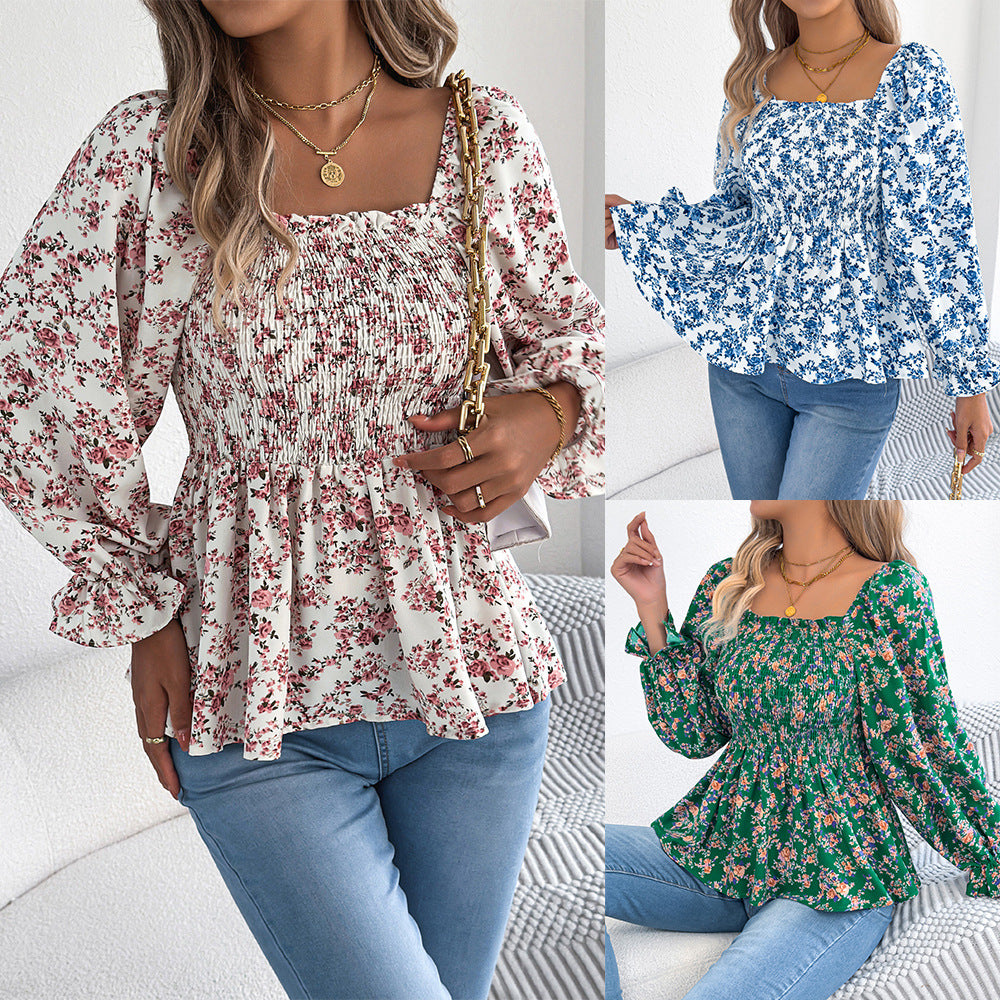 Damebluse med bred pasform og florale detaljer Stilla