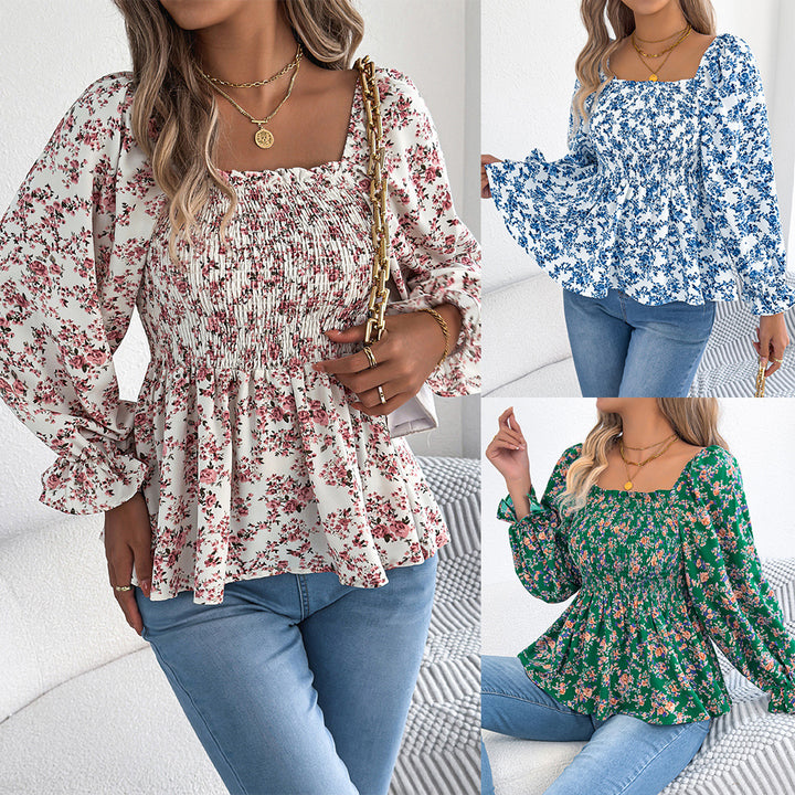 Damebluse med bred pasform og florale detaljer Stilla