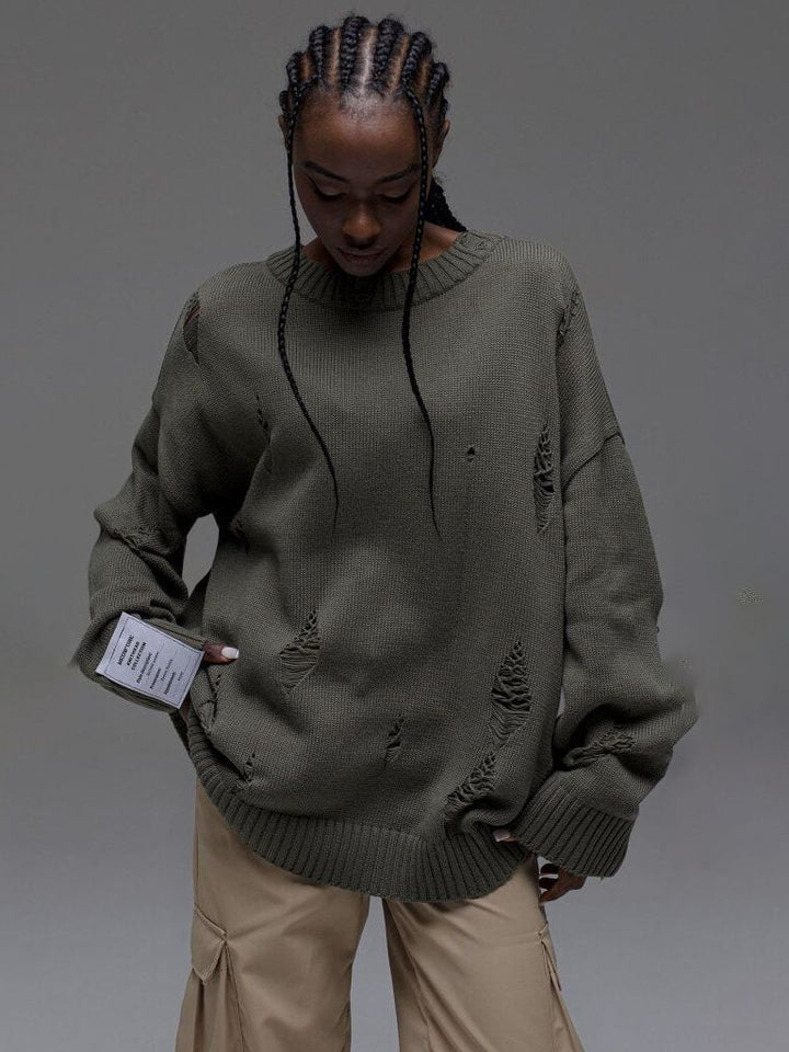 Kvinders chunky strik oversized sweater med slidte detaljer Stilla