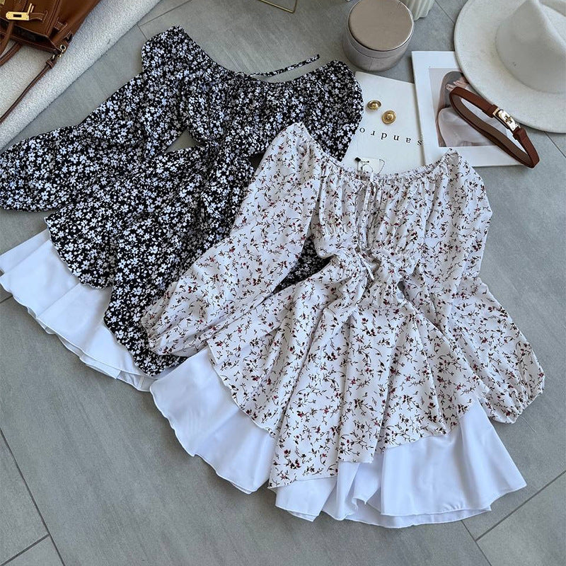Damebluse med rynket ærme og blomsterdesign Stilla