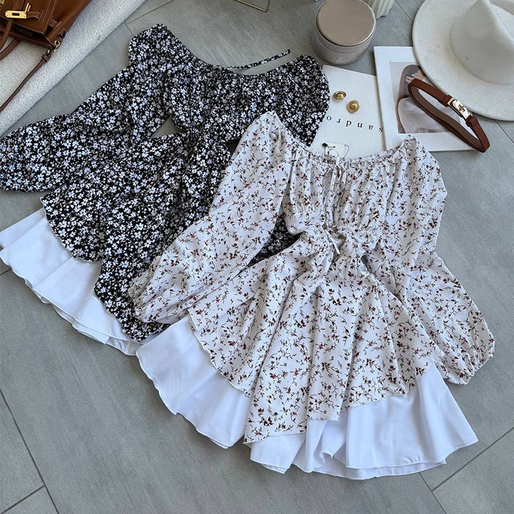 Damebluse med rynket ærme og blomsterdesign Stilla