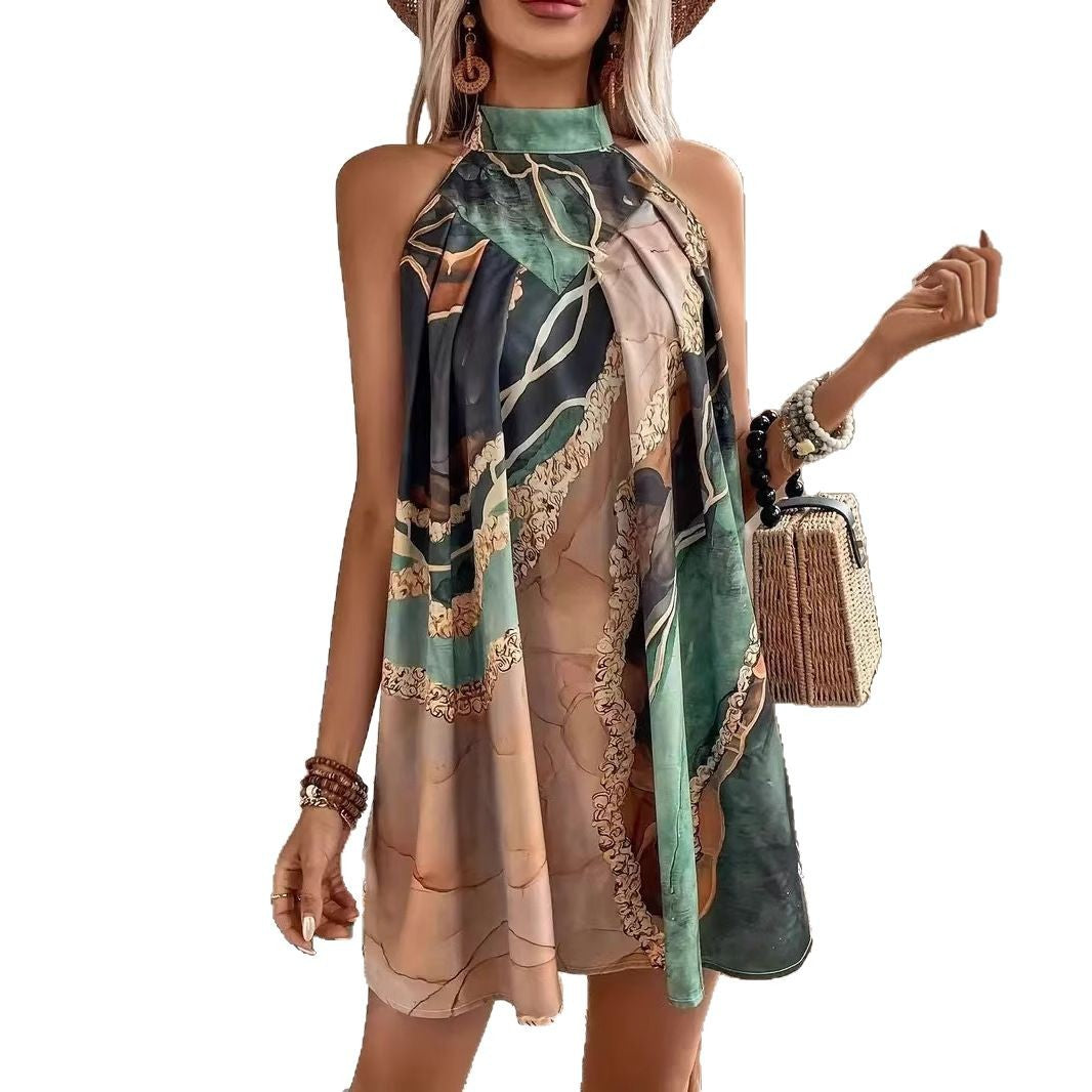 Dame halterkjole med elegant, flydende snit og kunstnerisk blomsterdesign Stilla