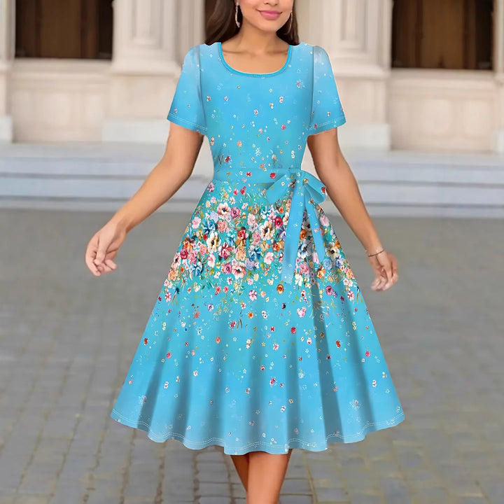 Dame Elegant silke kjole med blomsterdesign og figursyet bælte Stilla