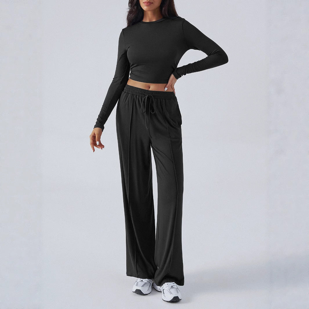 Dame Elegant lounge-outfit med stribet top og behagelige bukser Stilla
