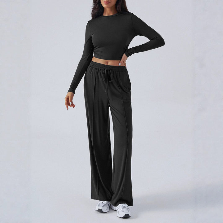 Dame Elegant lounge-outfit med stribet top og behagelige bukser Stilla
