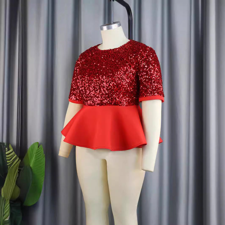 Damer elegant glitrende overdel med svajende peplum Skovae