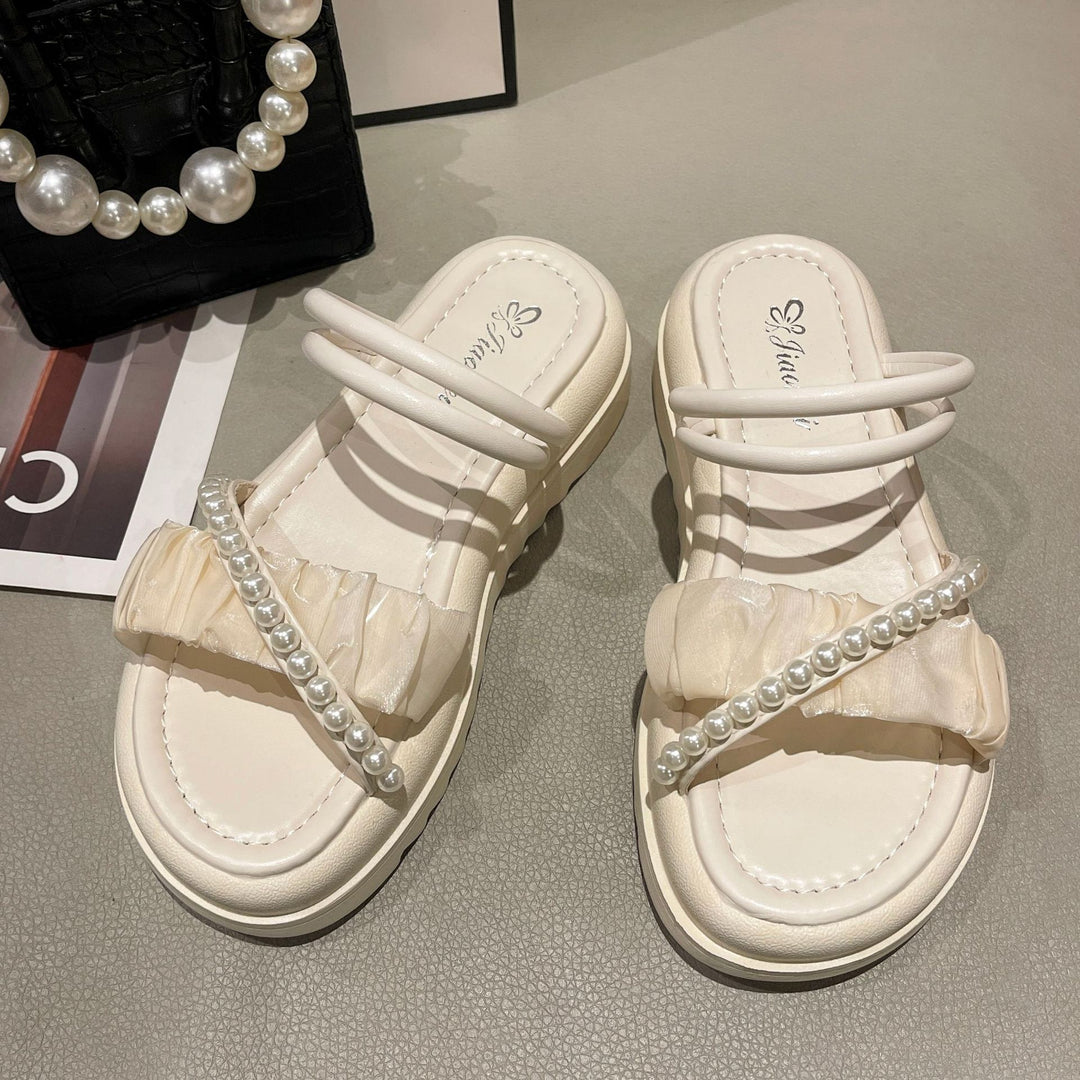 Dame sandaler med raffineret flæsedesign og elegante perledetaljer Stilla