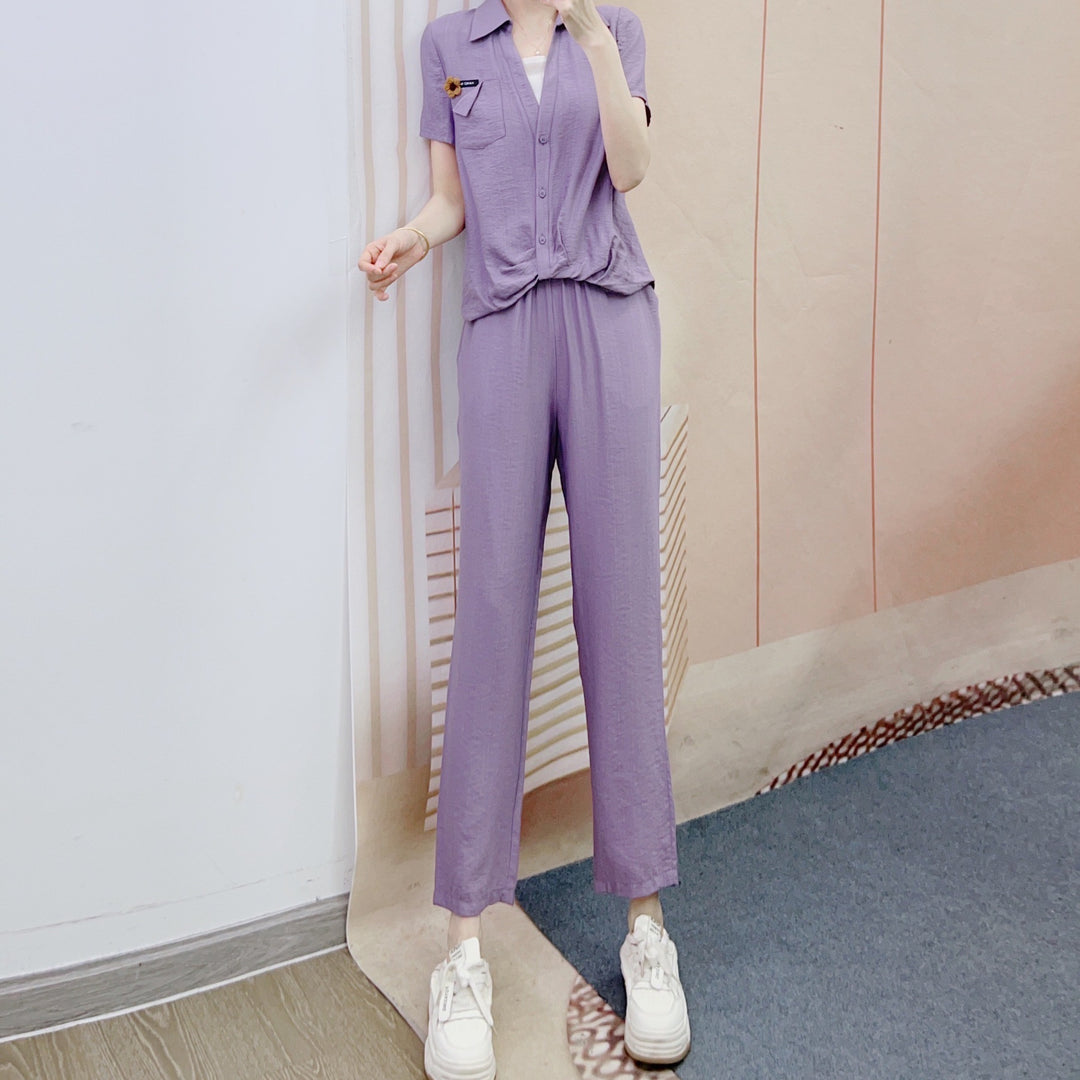 Dame afslappet jumpsuit med knapbart overdel og elegant taljebehandling Stilla