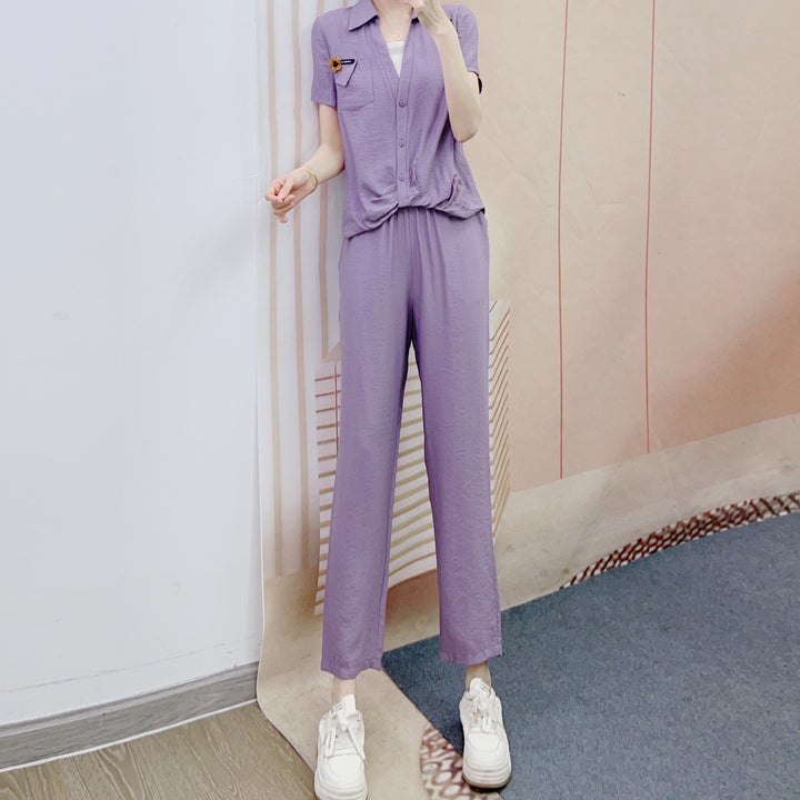 Dame afslappet jumpsuit med knapbart overdel og elegant taljebehandling Stilla
