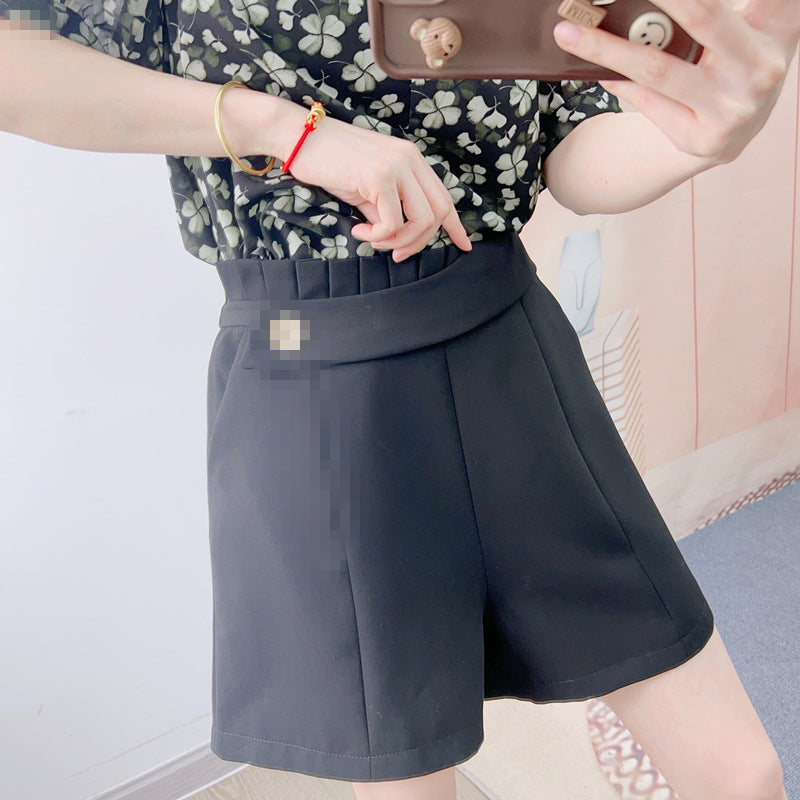 Dame elegante shorts med blomsterprint og figursyet design Stilla