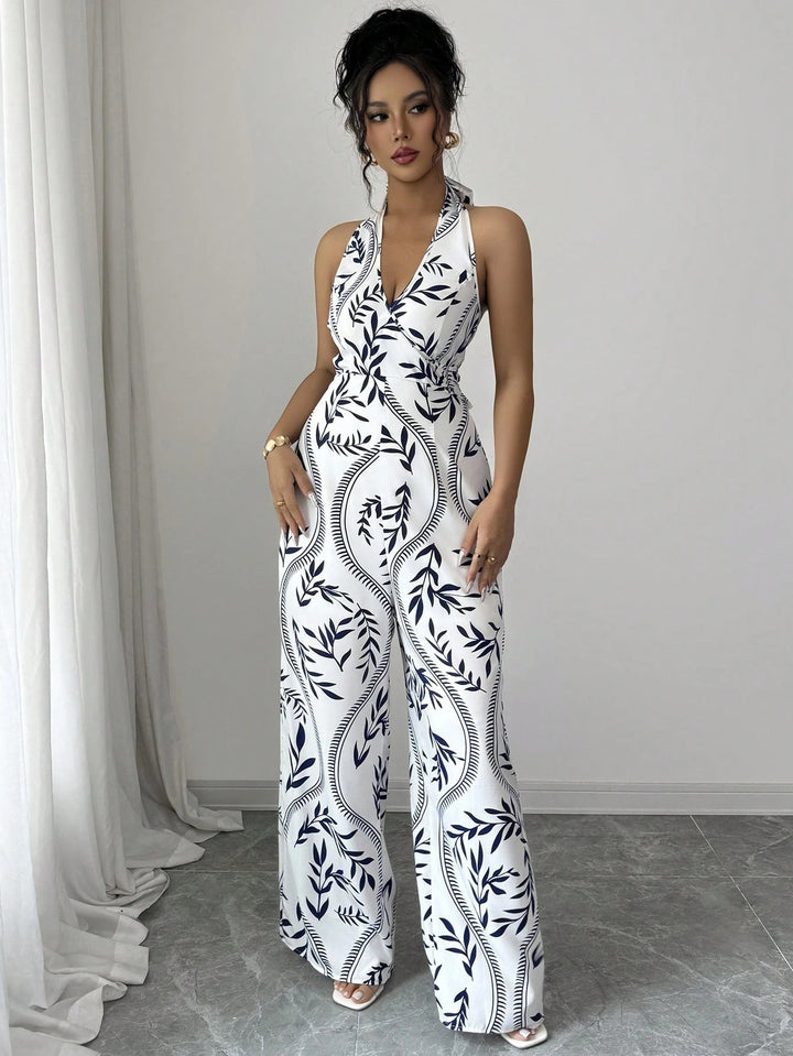 Dame jumpsuit med blomsterprint og smart V-hals Stilla