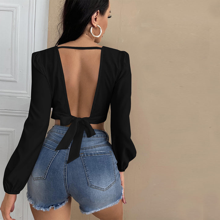 Kvindernes cropped top med dyb V-hals og elegante puffærmer Stilla