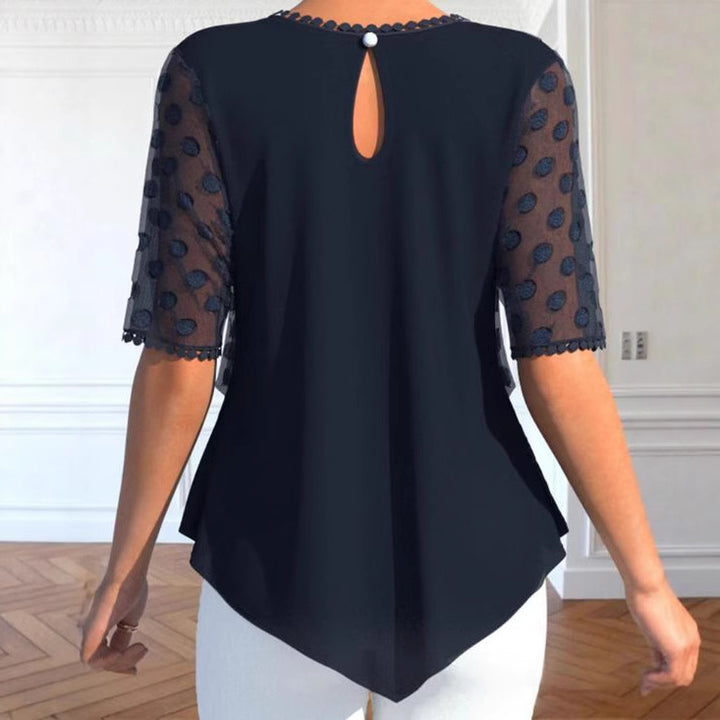 Damebluse med elegante strukturerede detaljer og modeindsats Stilla