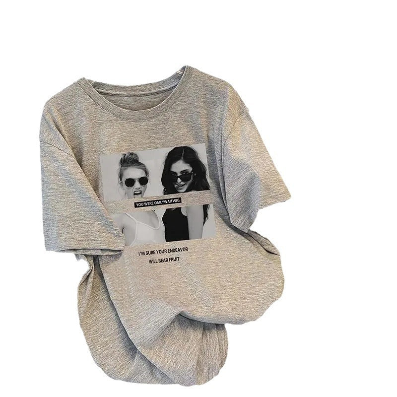 Dame T-shirt med kreativt design og inspirerende tekst Stilla