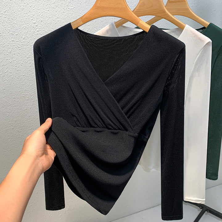 Dame elegant indpakningsbluse lavet af flydende materiale med raffinerede draperingsdetaljer Stilla