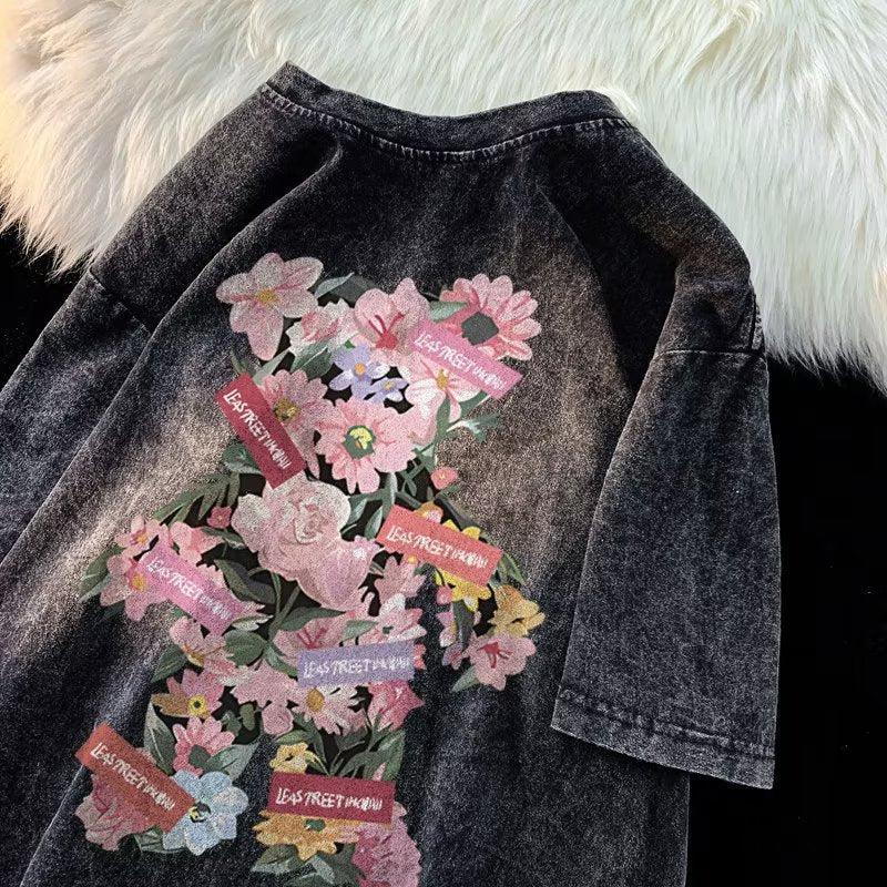 Dame Oversized T-shirt med floral grafisk tryk og afslappet snit Stilla