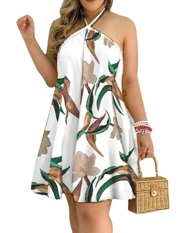 Dame luftig sommerkjole med floral design og smart halterneck Stilla