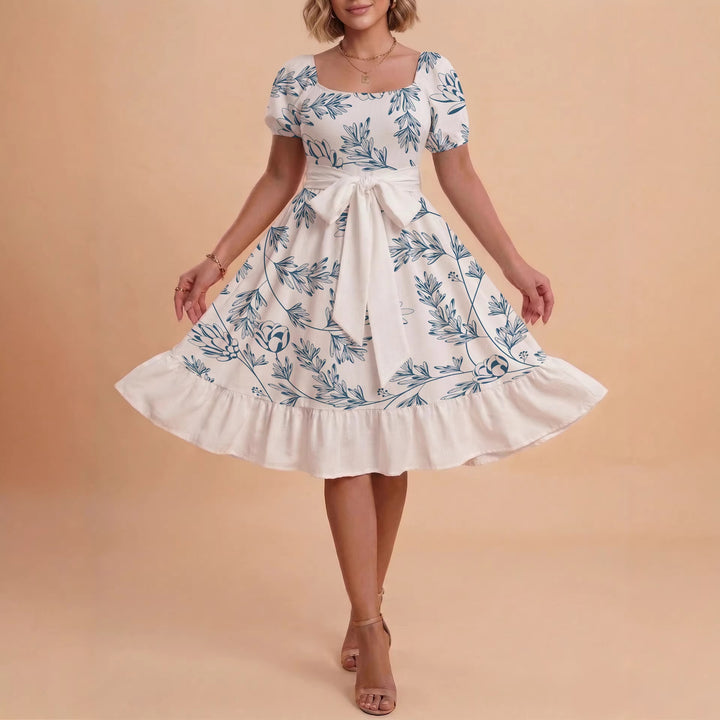 Dame Midi Kjole med elegant blomsterprint og figursyet bælte Skovae