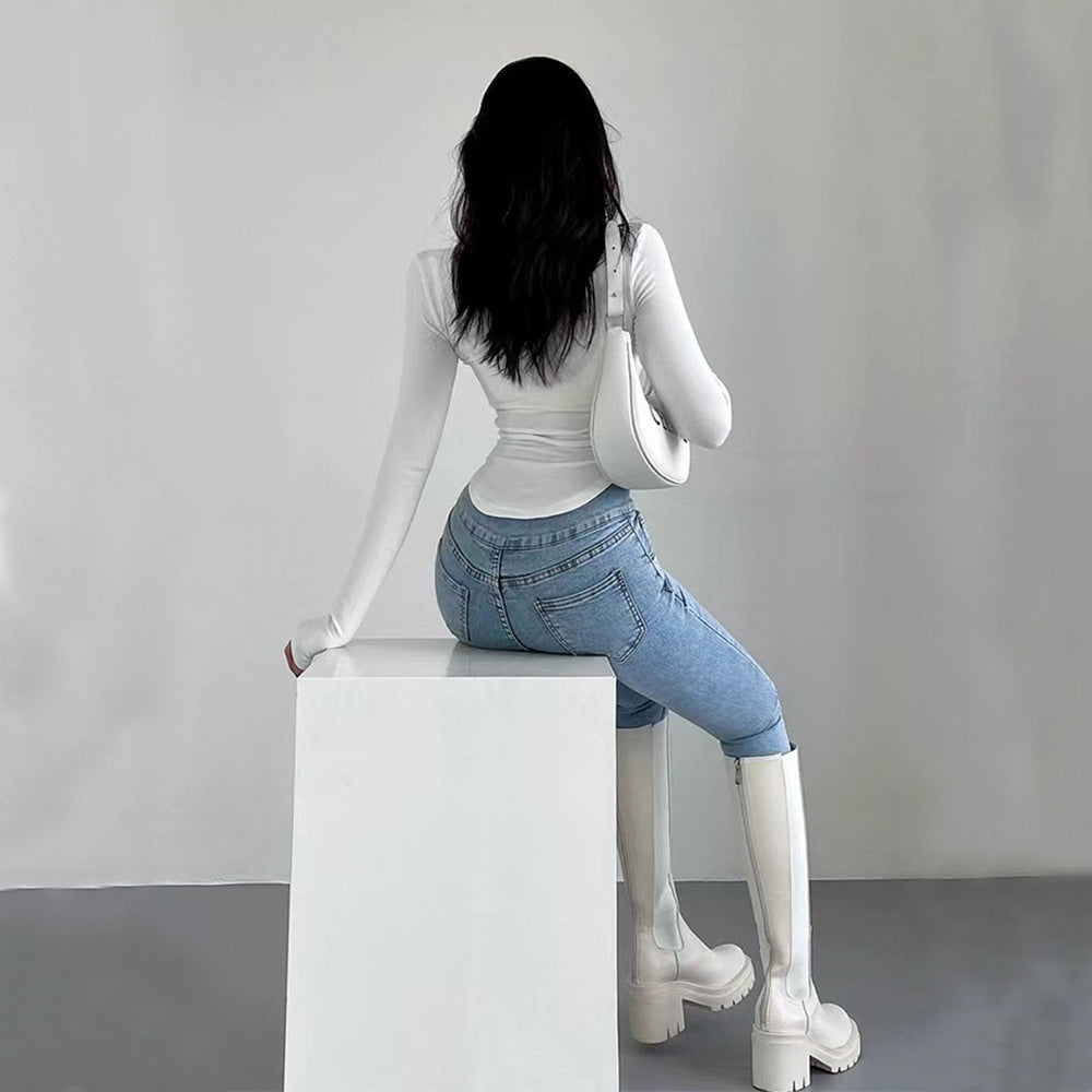 Kvinders langærmet crop top med høj krave og figursyet snit Stilla