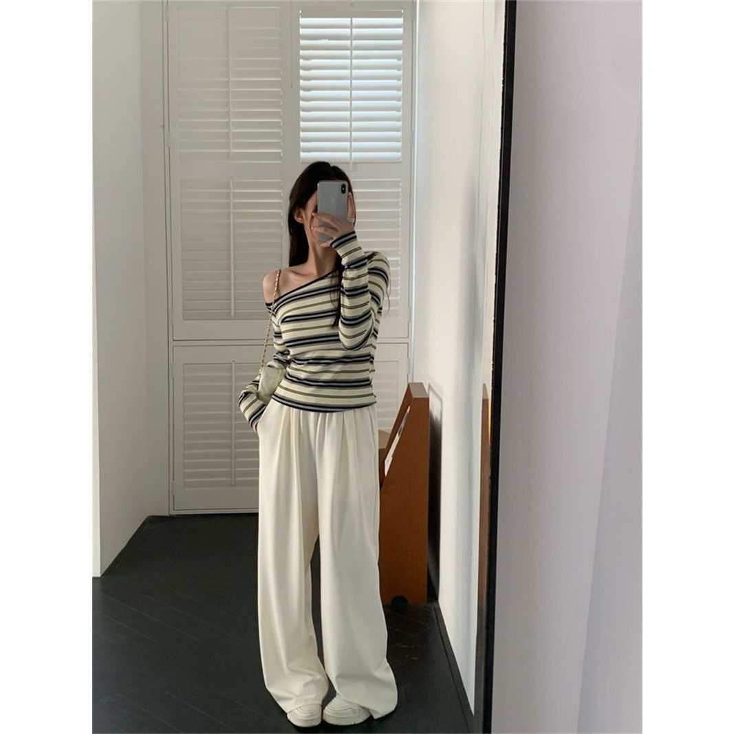 Damernes trendy langærmet skjorte med off-shoulder design og maritim stribemønster Stilla