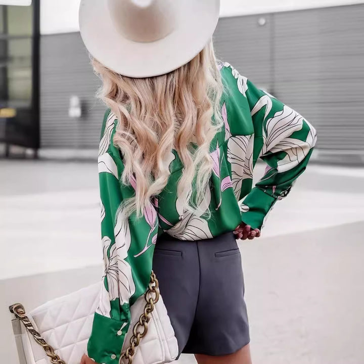 Damebluse med blomstret design og oversized snit Stilla