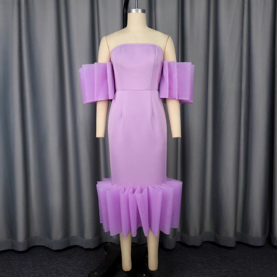 Damer Elegant Midi-kjole med voluminøse flæseærmer og asymmetrisk kant Skovae
