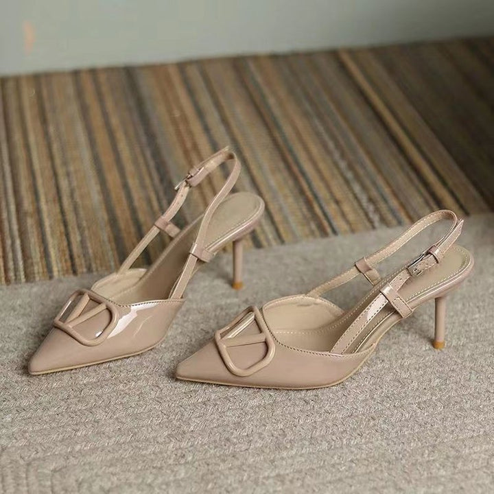 Dame Sling-Pumps med elegant spids form og justerbar rem Stilla