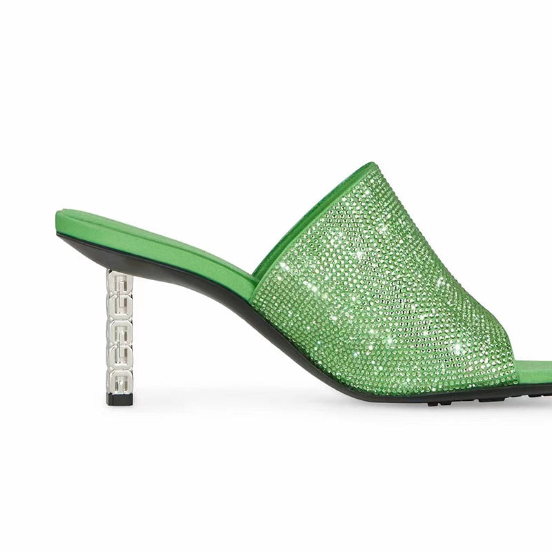 Femme Krystalbesatte Open-Toe Mules med skulpturel hæl Stilla