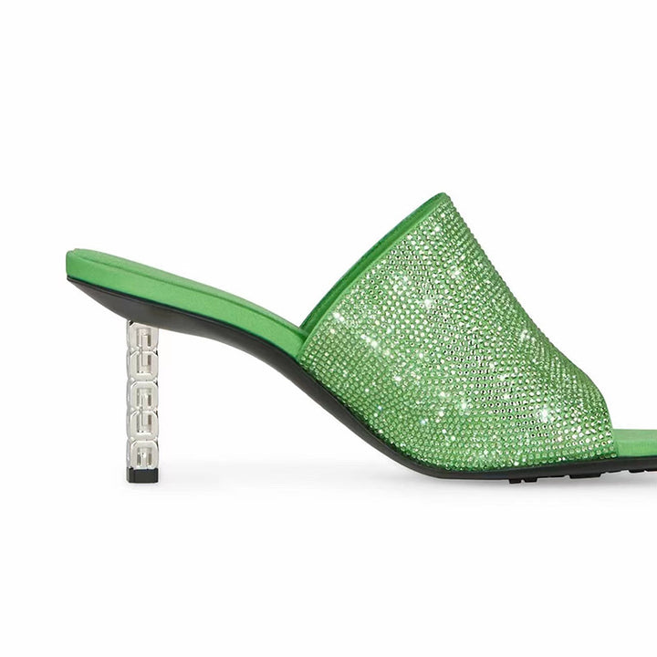Femme Krystalbesatte Open-Toe Mules med skulpturel hæl Stilla