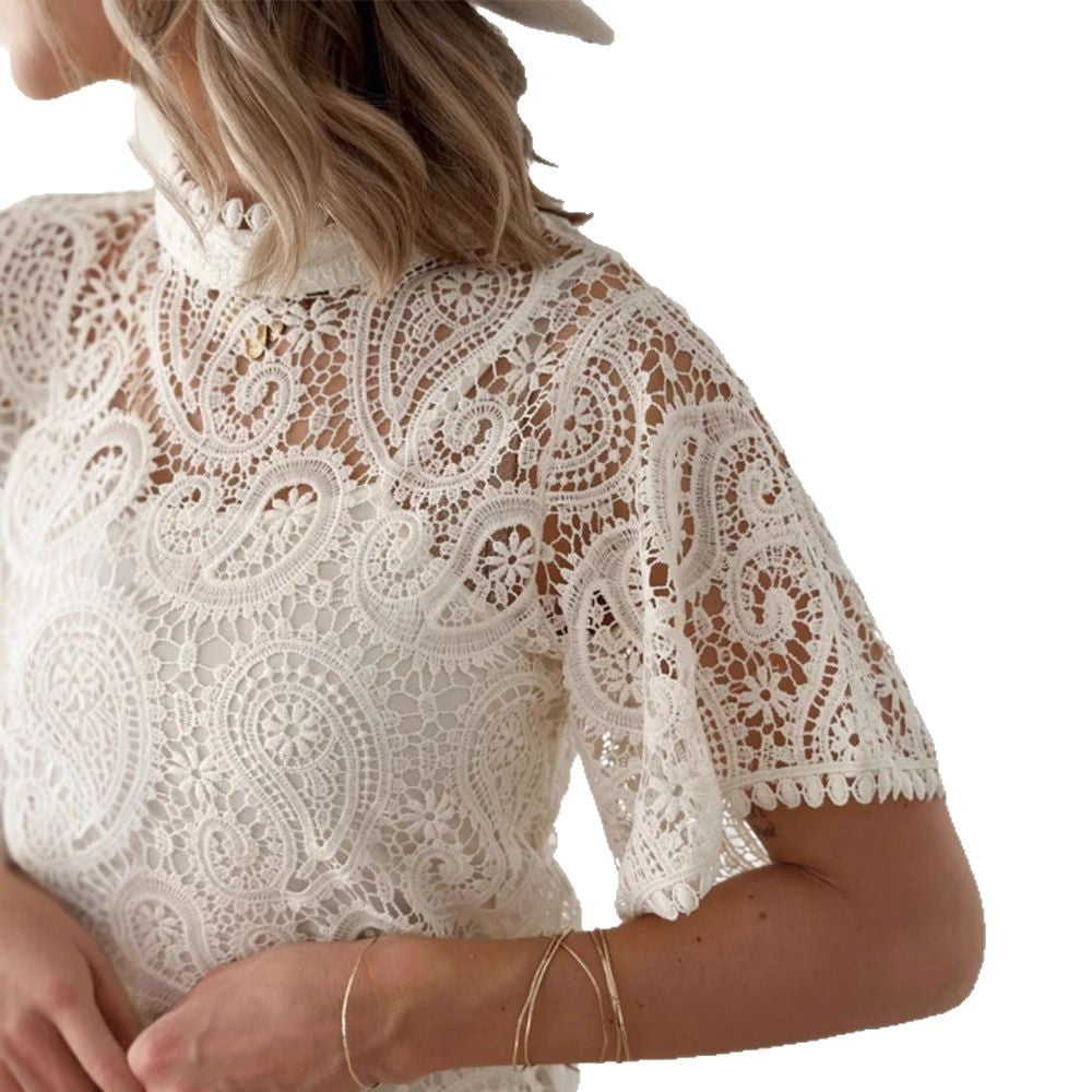 Dame spids top med blomsterlignende hul detaljer Stilla