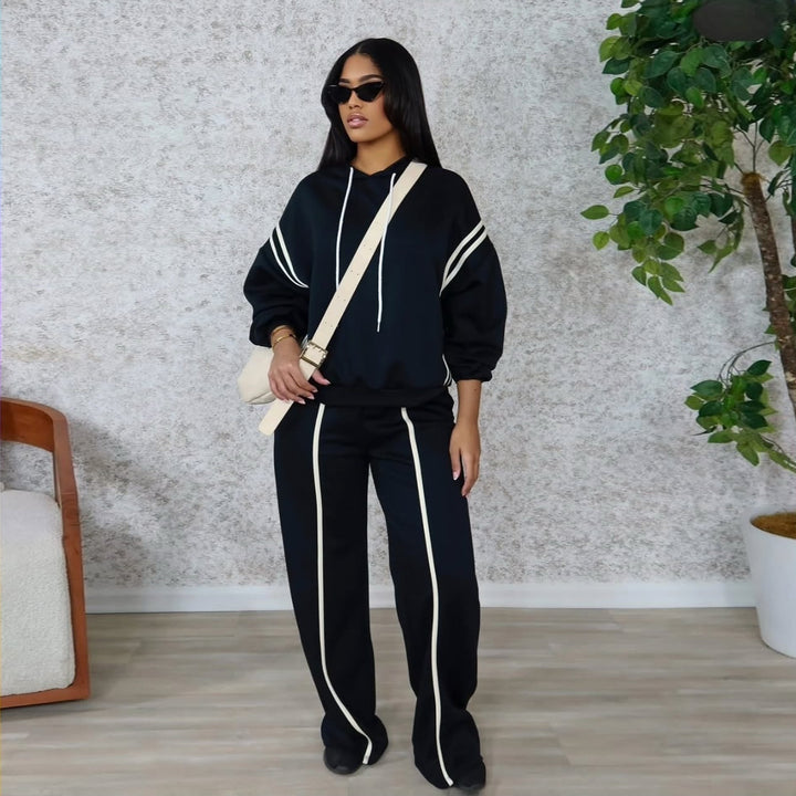 Kvinders sporty loungewear sæt med opfoldede ærmer og sidelister Skovae