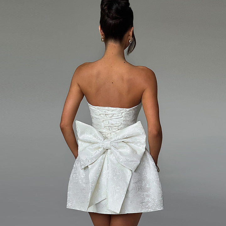 Dame off-shoulder cocktailkjole med elegant sløjfedetalje Skovae