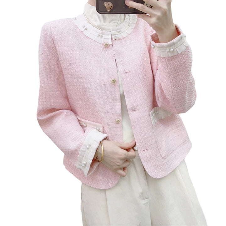 Dame elegant Bouclé-jakke med dekorative perlemorsknapper og struktureret design Stilla